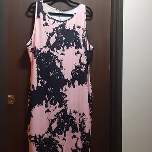 Long, flowing pink/black sundress.